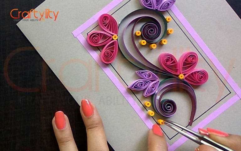 Paper quilling flower and scroll
